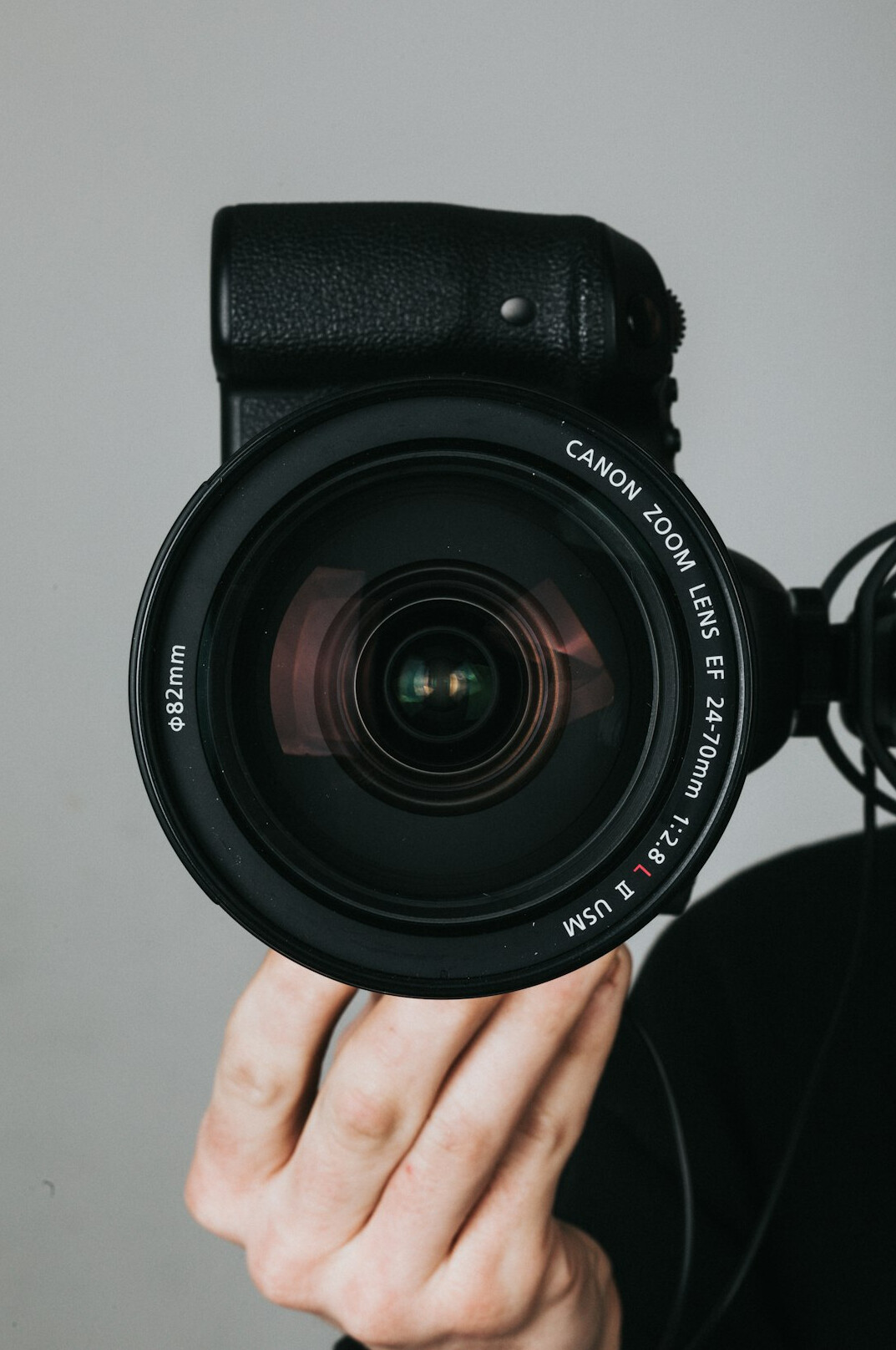 cinematographer adjusting camera