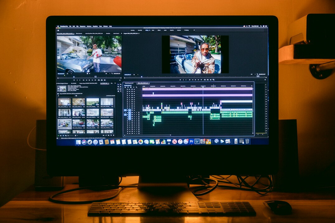 filmmaker editing video on computer